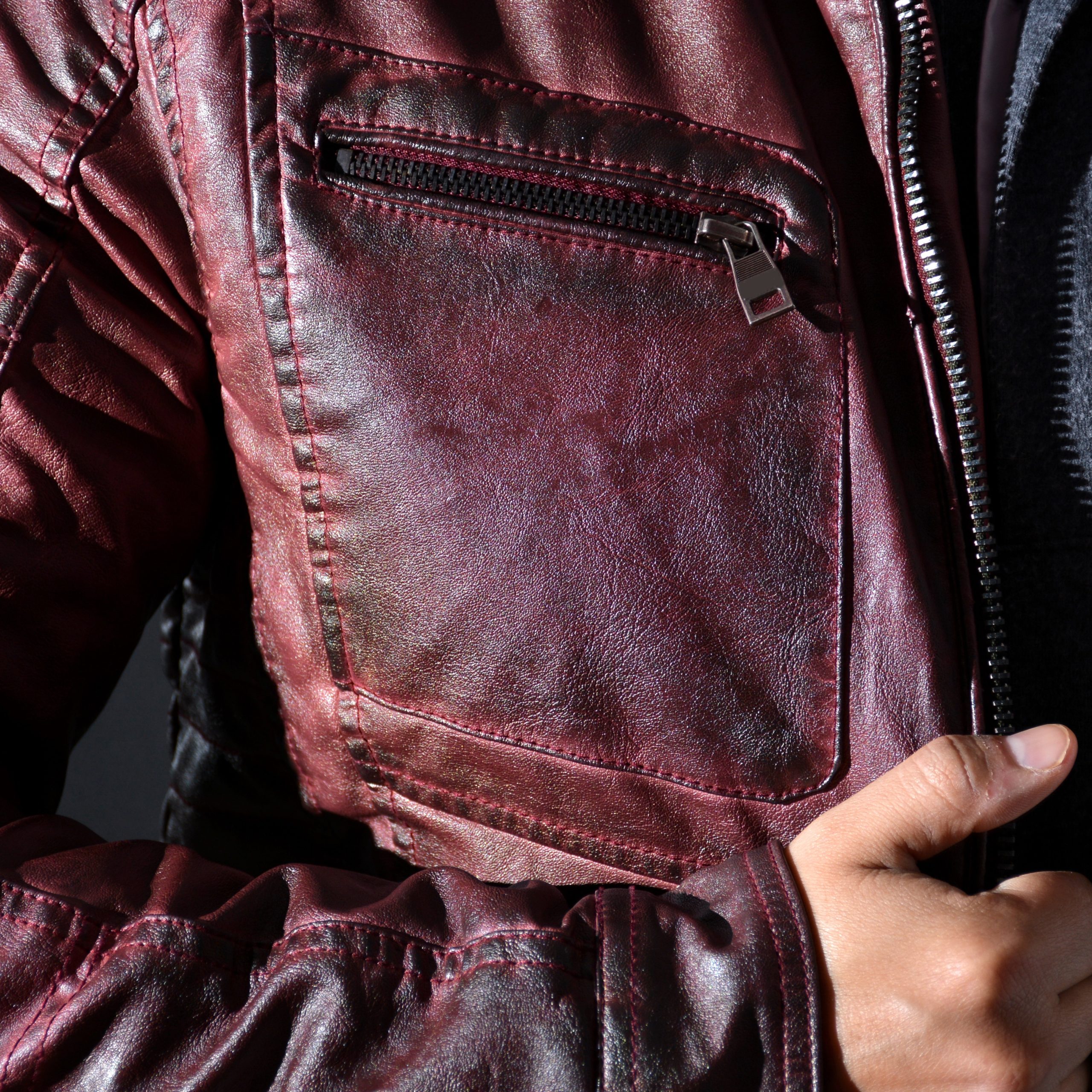 modern red leather jacket for men with zippers and buttons