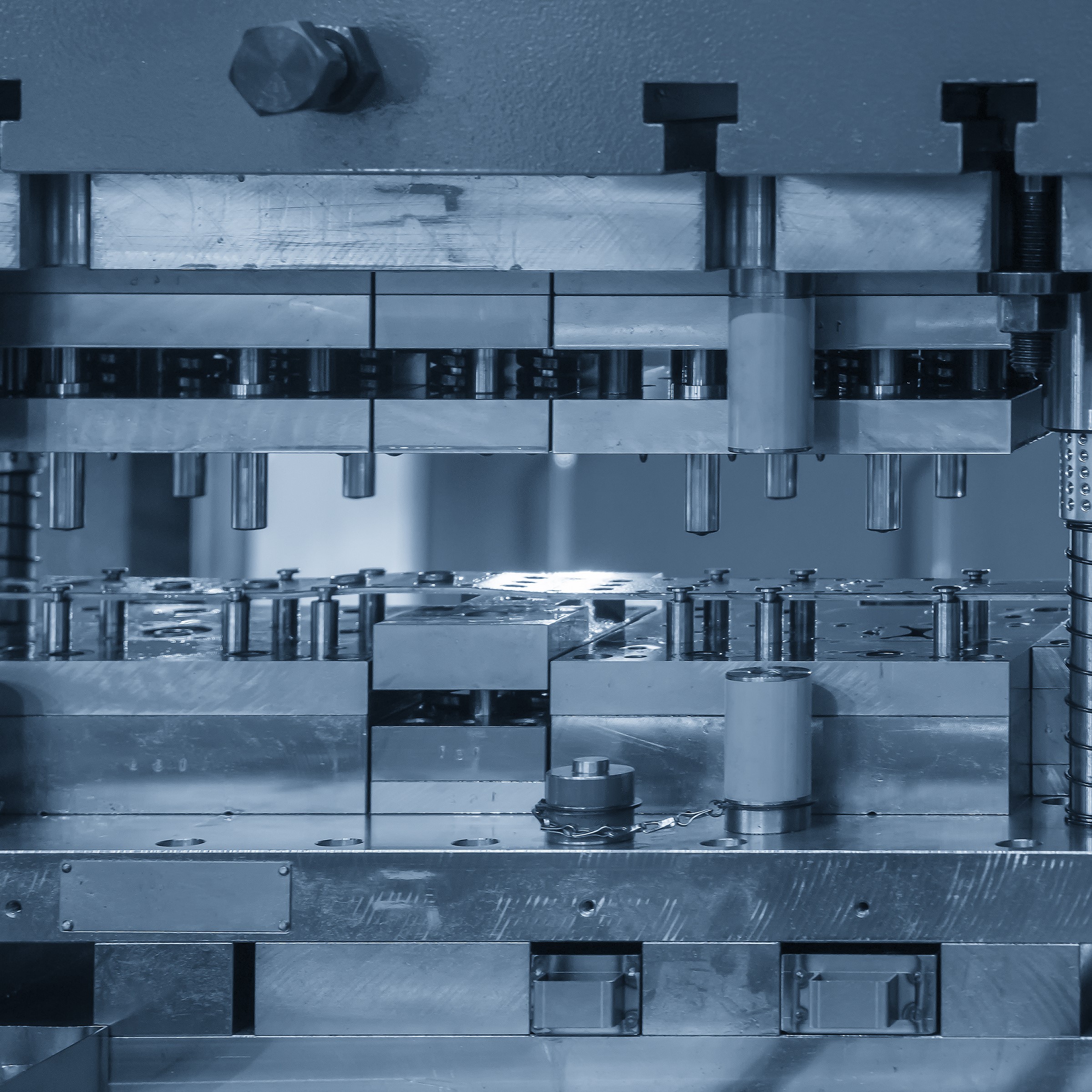 Close-up scene of progressive die operation. The metal work processing by stamping die.